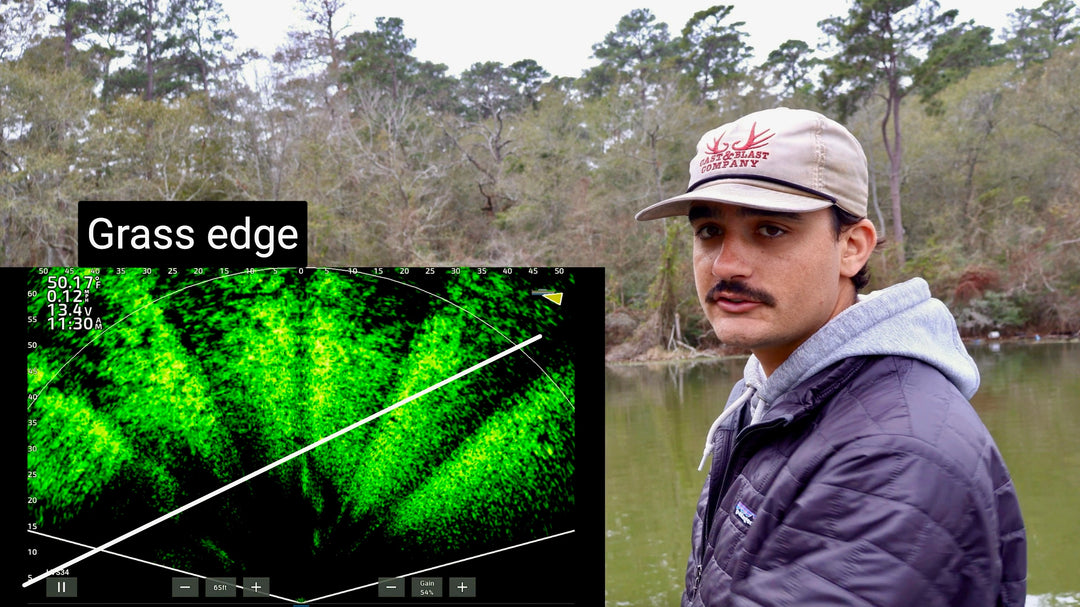 Person standing by a body of water with a grass edge labeled on a screen displaying green vegetation data.