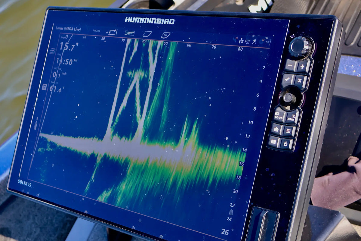 Humminbird fishing display screen with sonar graph on a boat